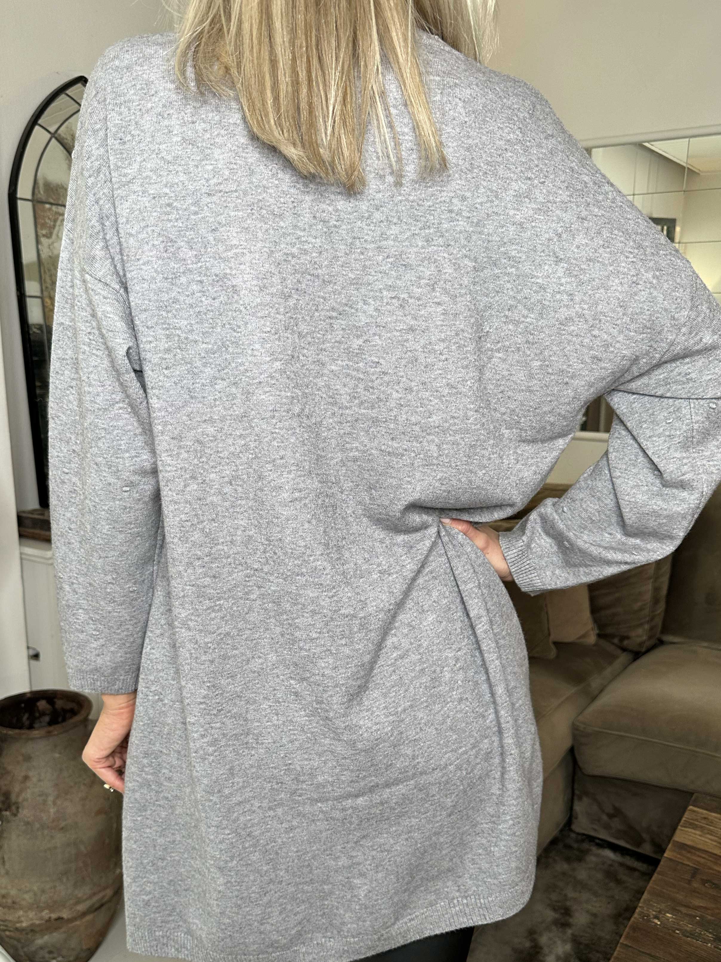 Zina - Strikbluse med prikket detaljer i stoffet